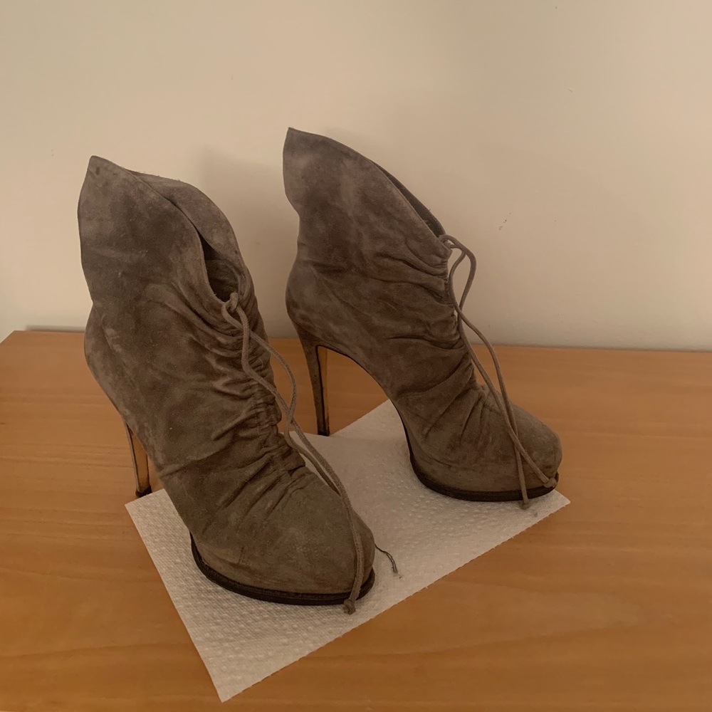Brian Atwood platform suede platform boots.